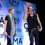Brian Kelley and Tyler Hubbard of Florida Georgia Line speak in the press room after winning Single of the Year and Vocal Duo of the Year during the 47th annual CMA Awards at the Bridgestone Arena on November 6, 2013 in Nashville, Tennessee. (Photo by Jason Davis/Getty Images)